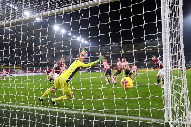 BURNLEY, ENGLAND - DECEMBER 29: Aaron Ramsdale of Sheffield United fails to save as Ben Mee of Burnley scores his team's first goal during the Premier League match between Burnley and Sheffield United at Turf Moor. (Photo by Alex Livesey/Getty Images)