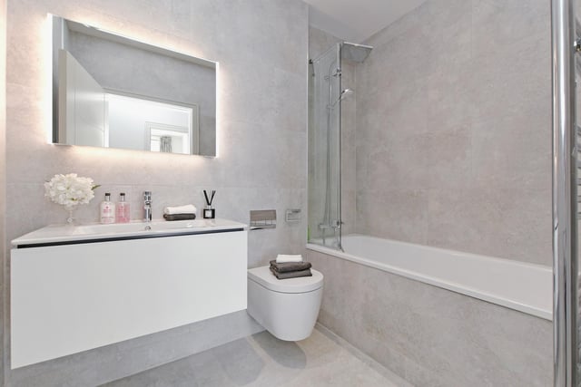 The family bathroom includes a Duravit white suite, chrome fixtures and fittings and high quality wall and floor tiling.