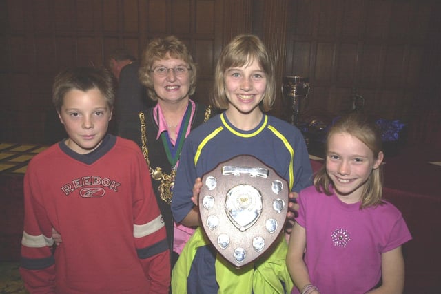 Pictured at the Sheffield Town Hall, where the Sheffield Marathon prize giving evening was held. Seen is The Lord Mayor Coun Pat Midgley with the  winner of the schools relay race Hunters Bar A team on the pic are Amy Hill, Catherine McDougall, and Robbie Spence.
