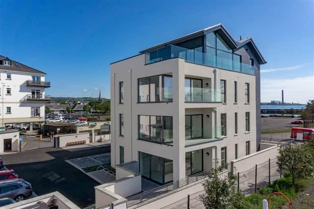 The Carrickfergus apartment has stunning views of Belfast Lough and the County Down coastline.  Photo: Hunter Campbell
