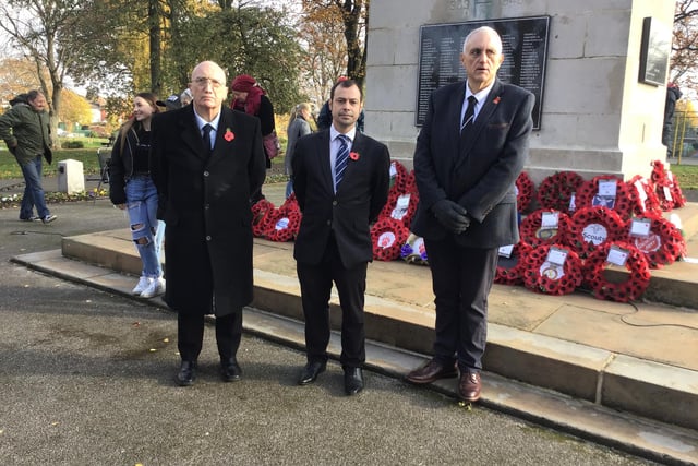 Hucknall councillors John Wilmott (left), Lee Waters and Dave Shaw (right) at the Cenotaph in Titchfield Park