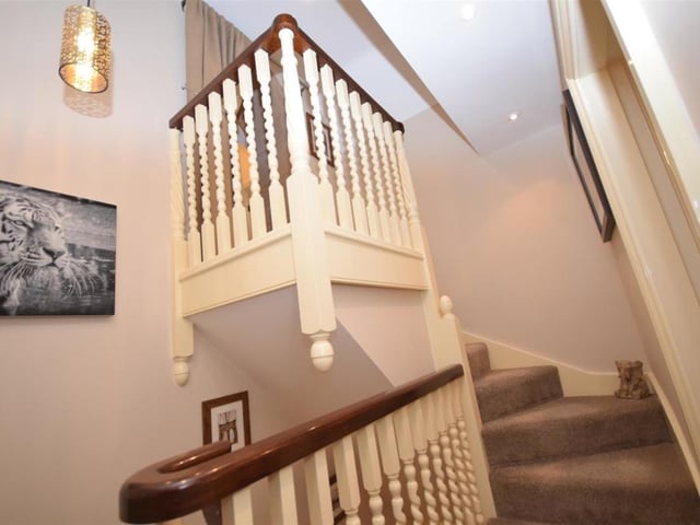 A stylish staircase winds its way to the second floor of the property, where you will find the other two bedrooms and also a shower room.