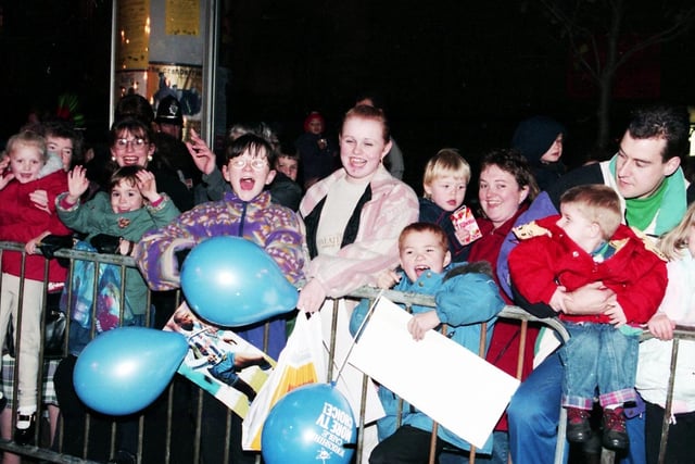 Excited children waiting in anticipation for the lights to be switched on in November 1994
