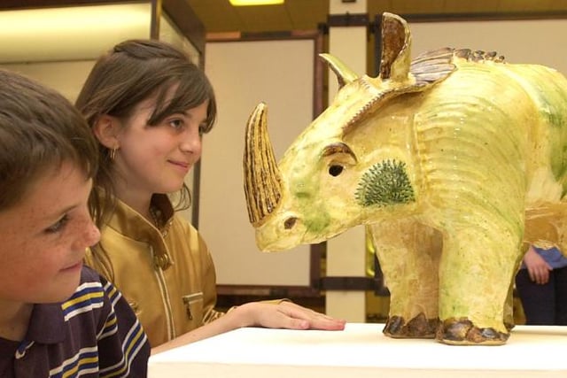 Sprotbrough artist Keith Mason made this rhino sculpture in 2001. Children Joe and Charlotte Cortness at the Doncaster Museum and Art Gallery.