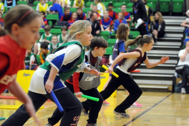They're off in a relay race from 2015. Recognise these young athletes?