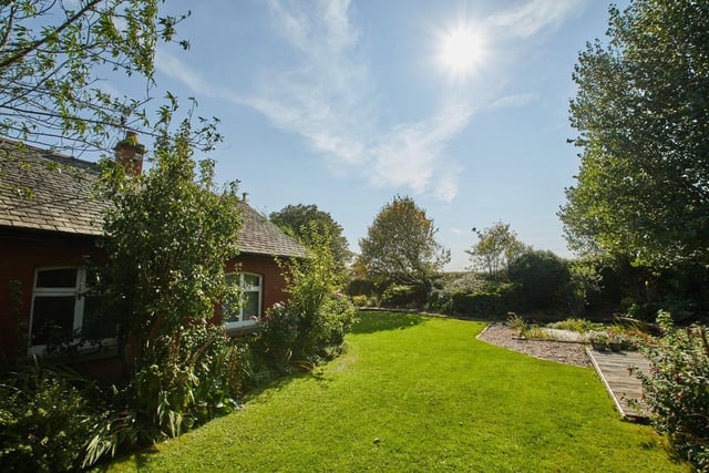 The property boasts landscaped gardens to the rear.