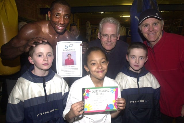 Pictured  at the Newman Road Gym, Wincobank, in 2003 where Bernelle Mitchell was seen with her outstanding effort award that she received for her work at Brinsworth Manor school. Seen with her are fellow young fighters Joe and Danny Bagley, watched over by Johnny Nelson, David Jones from Sheff University, and Brendan Ingle.