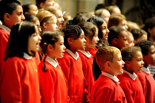 Children singing for Her Majesty the Queen during her visit to Sheffield Cathedral  on November 18, 2010