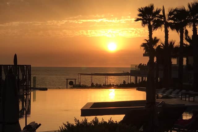 Idyllic by day, breathtaking by night, the sun sets on beautiful Ibiza