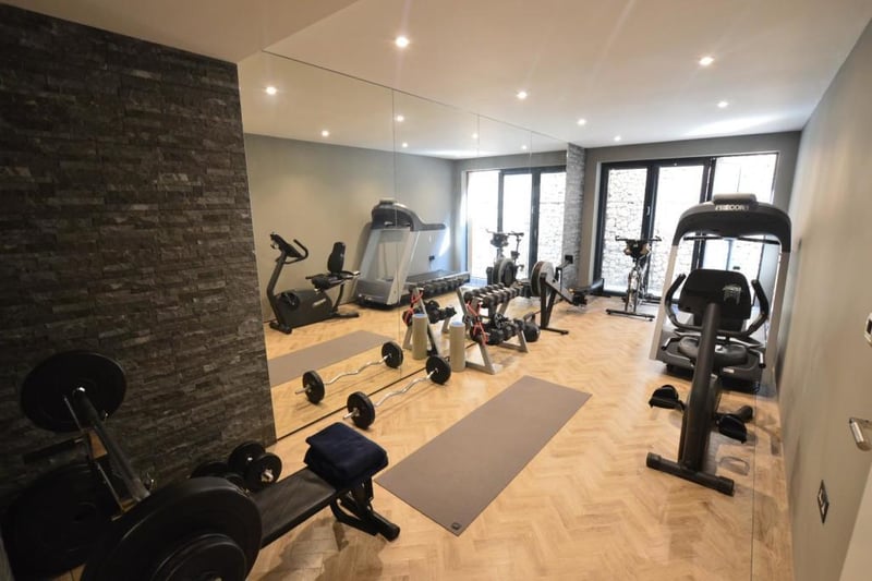 A private gym is located at the rear of the property along with with a sauna and walk in shower.