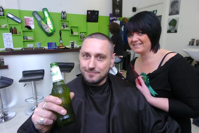 Pictured at the Gents Division men's hairdressers, Abbey Lane, Sheffield,  which is the only barbers in Sheffield to have a drinks licence. Seen with a beer is customer  Neil Bradley, with manageress Andrea Glover cutting his hair in 2009