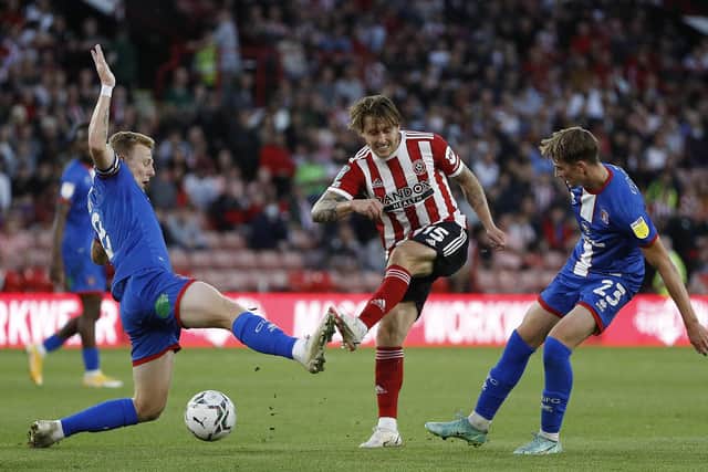 Luke Freeman of Sheffield United shoots at goal during the Carabao Cup match against Carlisle United at Bramall Lane: Darren Staples / Sportimage