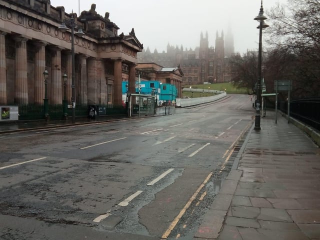 The Mound in Edinburgh is a popular route for buses, cars and pedestrians to travel through this city, but this morning it was pictured completely abandoned as residents take the recent 'stay at home' rules seriously