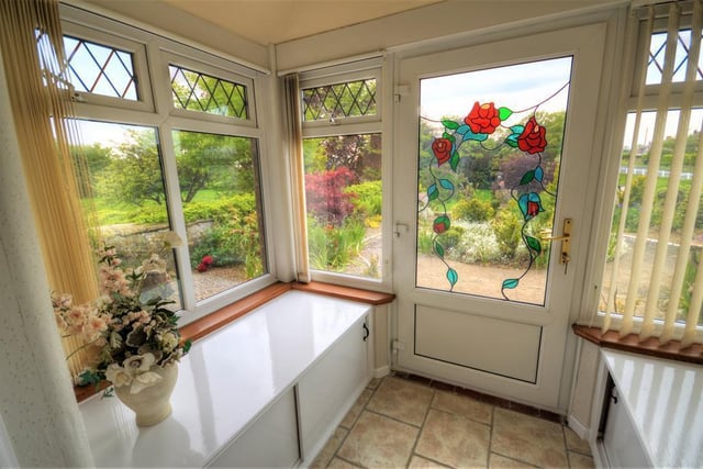 The front conservatory is situated specifically to look over the landscaped gardens.