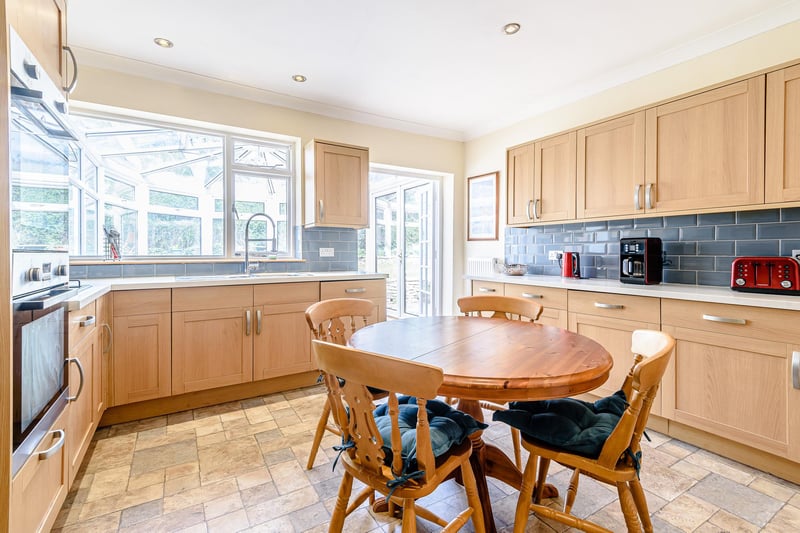 The breakfast kitchen has a comprehensive range of fitted kitchen furniture and work surfaces. Appliances include a twin oven with a four ring hob and extractor hood, fridge freezer and a dishwasher. A window looks directly into the conservatory and there is a personal door to the garage.