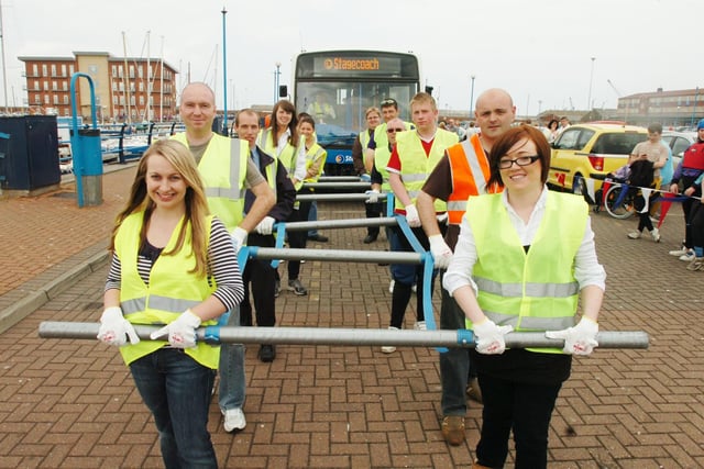 Were you pictured at this charity bus pull in 2008?