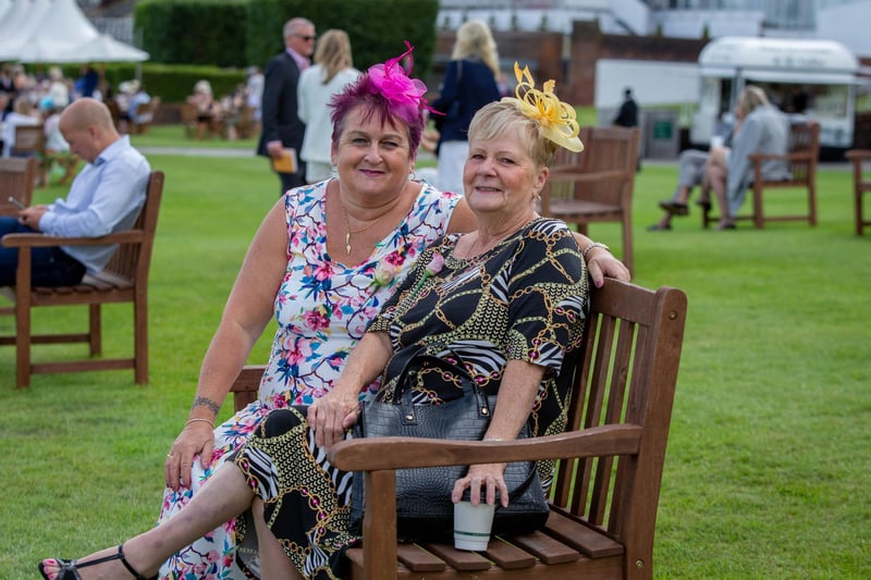 Ladies Day at Qatar Goodwood Festival, Goodwood on 29th July 2021
Pictured:  Teresa Hills and Sylvia Marks from Gosport 
Picture: Habibur Rahman