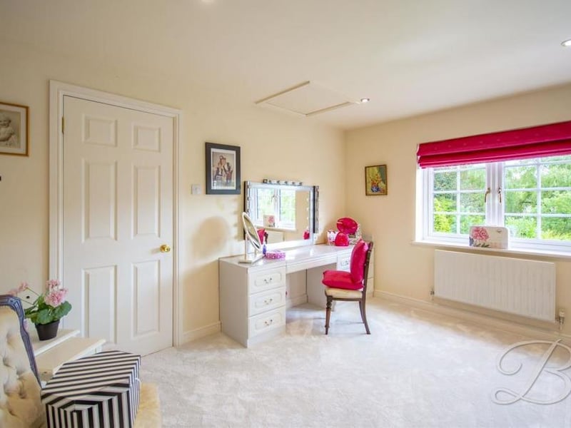 Another upstairs room full of character. A window to the side offers plenty of natural light.