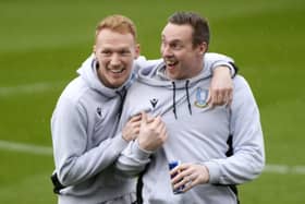 Owls keepers Cameron Dawson and David Stockdale share a laugh on the pitchbefore the game   Pic Steve Ellis