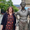 Sheffield heritage champion Coun Janet Ridler standing next to the city's famous Women of Steel statue outside Sheffield City Hall
