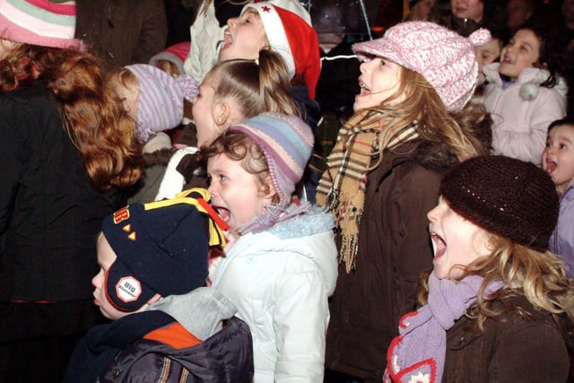 The crowds enjoying the Punch and Judy show at Sutton light switch-on in 2006