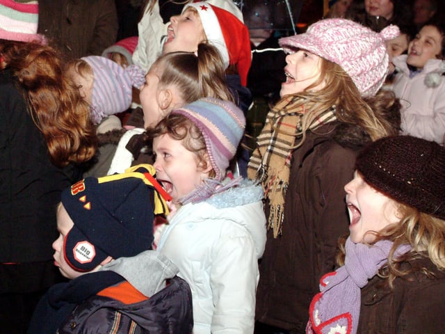 The crowds enjoying the Punch and Judy show at Sutton light switch-on in 2006
