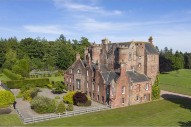 Surrounded by glorious gardens and parkland, this exquisite fortified castle is built from a distinctive red sandstone and displays crowstepped gables, castellated turrets and astragal windows.