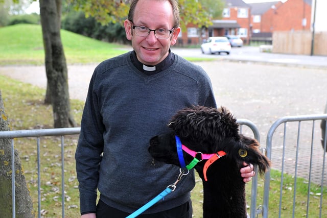 Fr Adrian Tuckwell from St Teresa's church petting one of the Alpacas during an exhibition to raise funds for St Teresa's and St Patrick's Churches. Remember this from eight years ago?