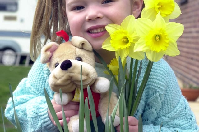 Shayle Hutchinson, aged four, of Askern, with an Easter Bunny and a handful of daffodils back in 2002
