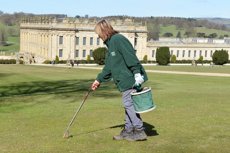 A volunteer keeping the gardens tidy at Chatsworth.