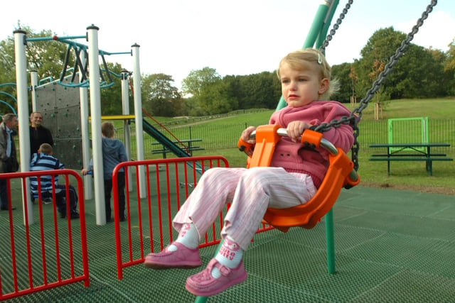 Two-year-old Emma Kay enjoying a swing on Woolley Wood playground in 2007