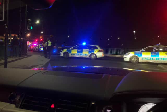 Two men died when the car they were travelling in plunged into the River Don after ploughing through railings on Meadowhall Way, Sheffield