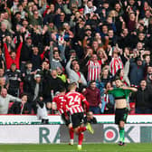 Sheffield United's David McGoldrick (right) celebrates scoring his side's winner against Stoke City: Isaac Parkin/PA Wire.