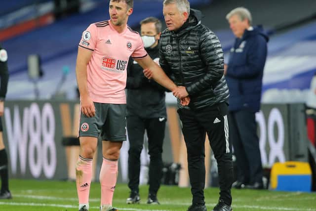 Enda Stevens receives instructions from Sheffield United manager Chris Wilder: Paul Terry/Sportimage