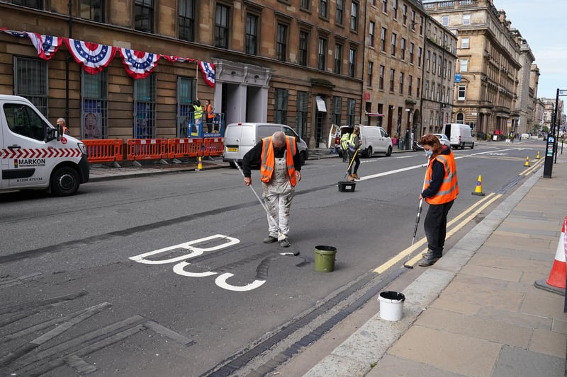 Road markings are painted black in Glasgow city centre ahead of filming