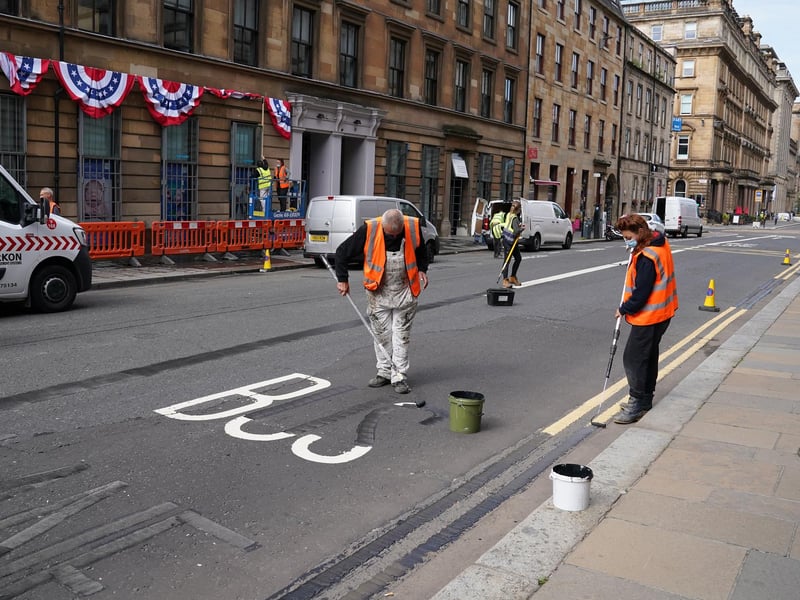 Road markings are painted black in Glasgow city centre ahead of filming