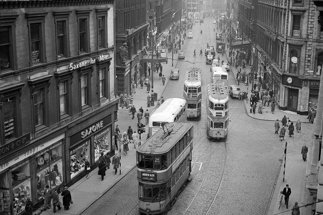 Trams in  Union Street,  Glasgow. The city waved farewell to its 'caurs' in 1962.