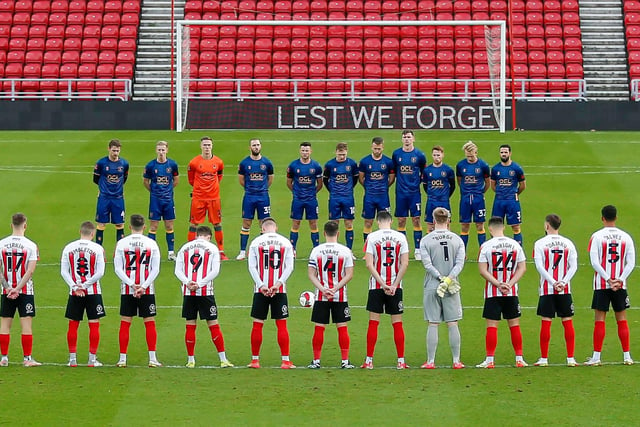 Both teams observe a minutes silence for Remembrance Day.