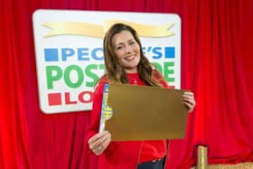 Sheffield has struck it rich – with six neighbours in Shiregreen landing on nearly a quarter of a million pounds.Pictured is Postcode Lottery ambassador Judie McCourt