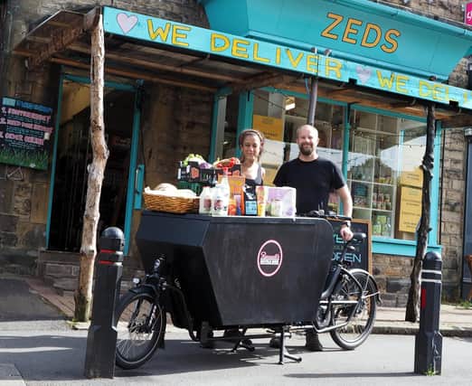 Nicola Newman of Zed's with Russell Cutts of Russell's Bicycle Shed and his cargo bike, ready for their first set of deliveries
