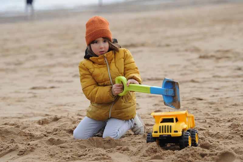 Harrison playing in the sand at Littlehaven Beach in South Shields.