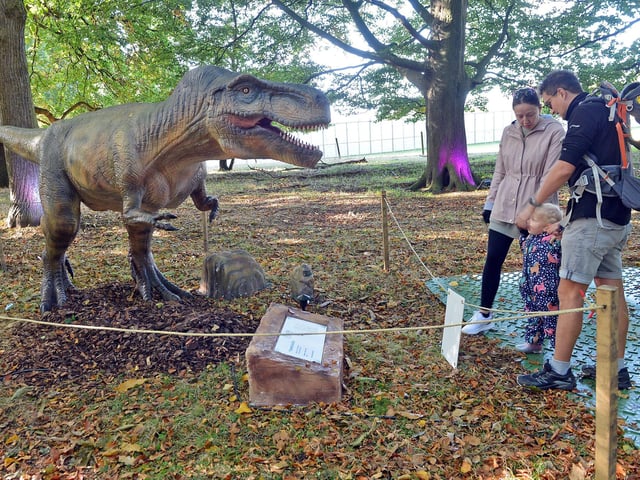 The animatronic dinosaurs are scattered throughout the woodland trail