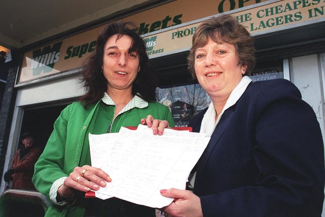 Janet Rastrick, manager at the Eckington branch of Willis Supermarkets with petition to increase policing in the area, with her is Deputy Manager Julie Munnelly back in 2000
