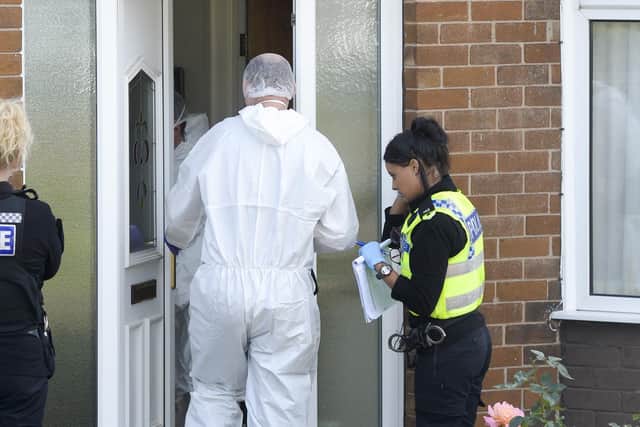 Police officers and scenes of crime officers at a property in Orgreave Lane Sheffield, where the body of an 86 year old man has been discovered.
Picture Dean Atkins
