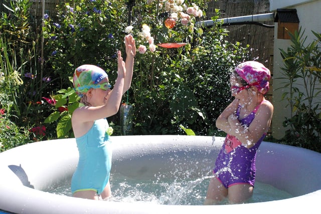 Chrissy Williams, six-year-old twins granddaughters in her spa having a splashing time.  This one was judged 2nd place.