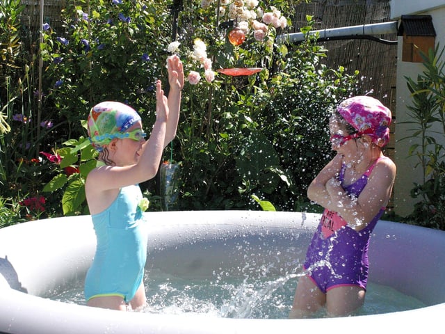 Chrissy Williams, six-year-old twins granddaughters in her spa having a splashing time. This one was judged 2nd place.