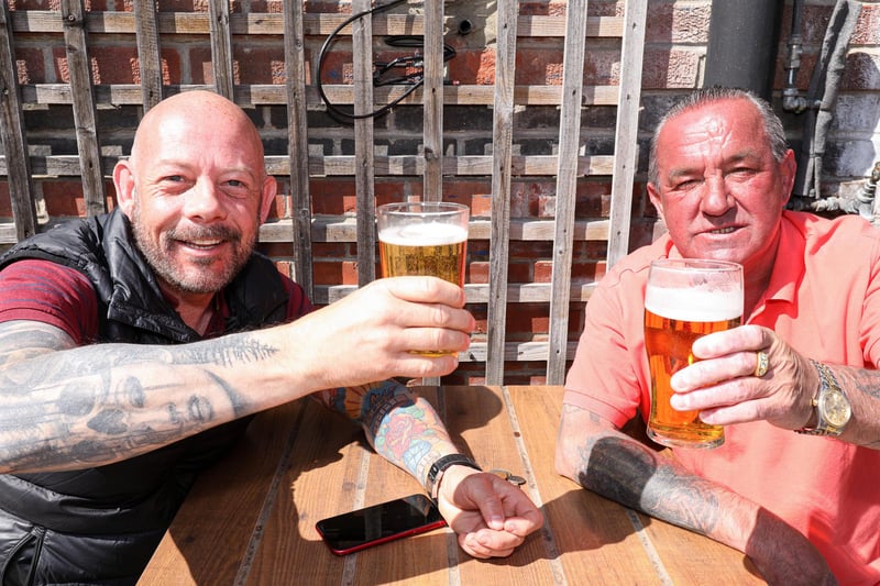 Mike Laybourne, left, and David Tee. Drinkers enjoy the sunshine at the Parchment Makers, Havant. Picture: Chris Moorhouse (jpns 240421-15)