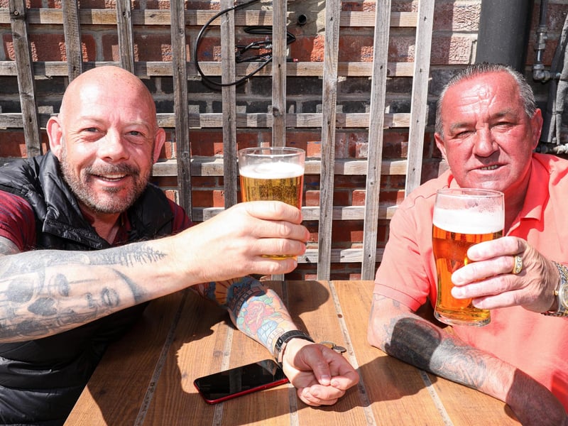 Mike Laybourne, left, and David Tee. Drinkers enjoy the sunshine at the Parchment Makers, Havant. Picture: Chris Moorhouse (jpns 240421-15)