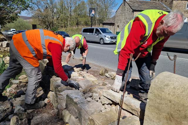 Wall building volunteers for the National Trust at Longshaw: Philip Benson, Brian Curtis and Roger Salt.