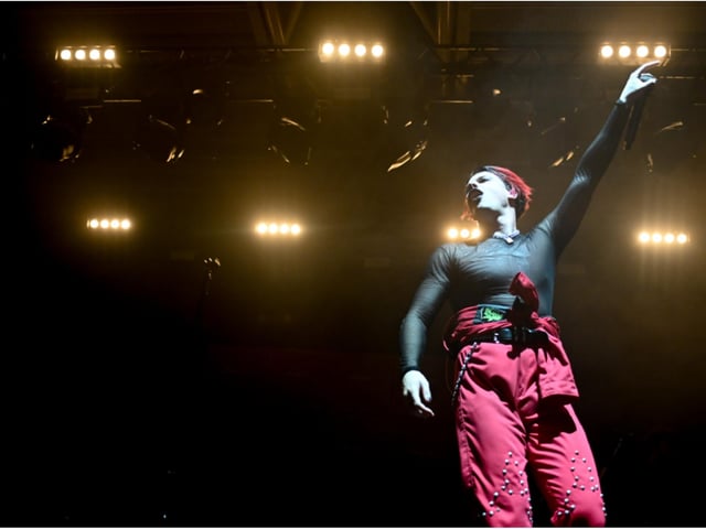 The singer, whose real name is Dominic Harrison, was in trademark fiery form.
